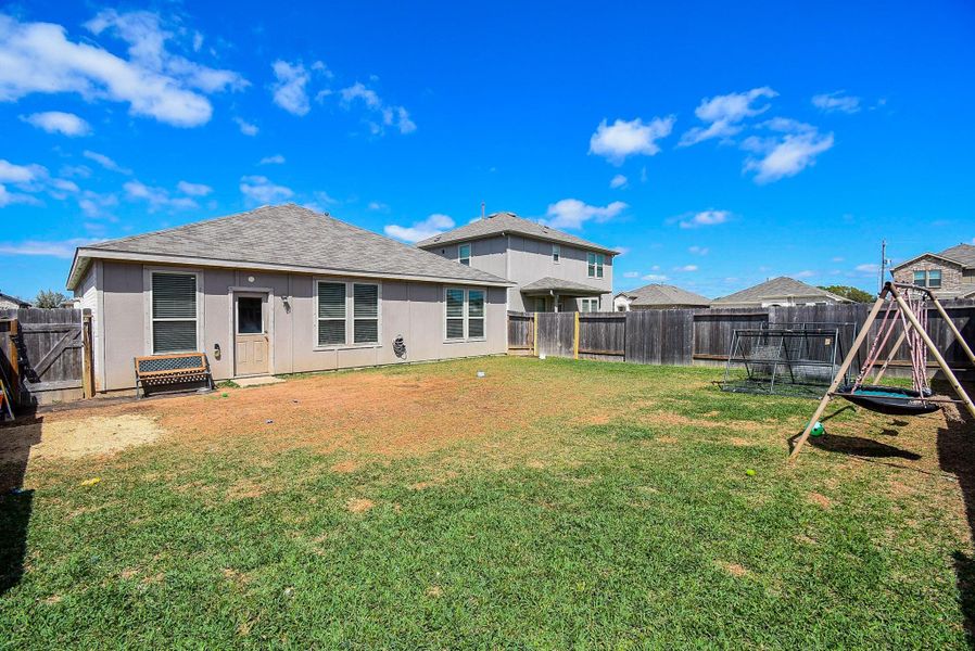 Exterior details and patio area of a home in , Alvin (Image 3).
