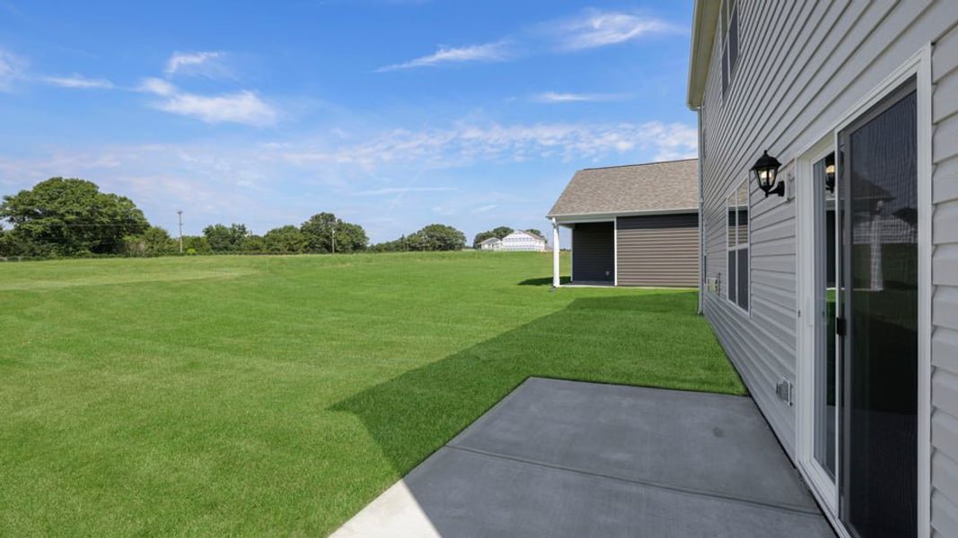 Exterior details and patio area of a home in Durbin Meadows Traditions, Fountain Inn (Image 25). Exterior details and patio area of a home in Durbin Meadows Traditions, Fountain Inn (Image 25).