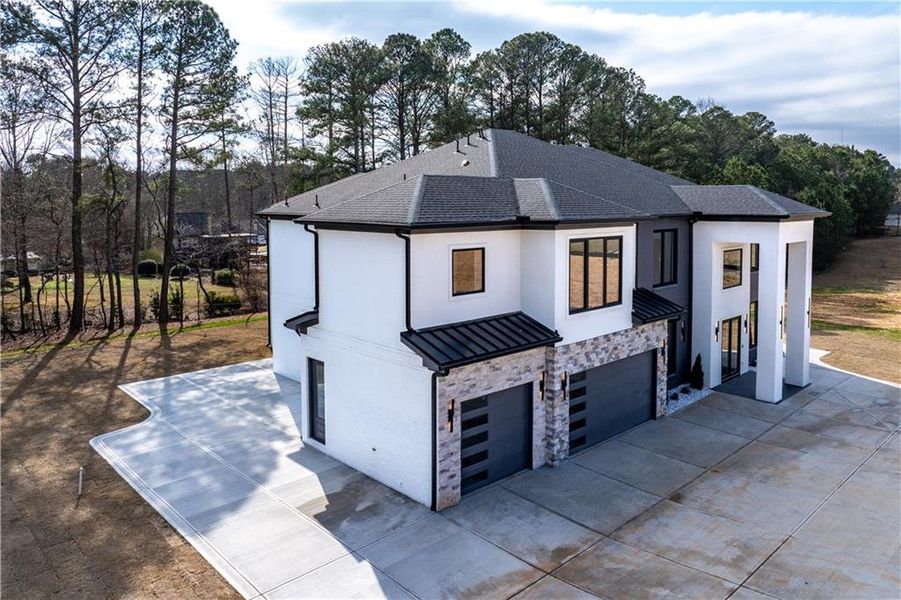 Front exterior of a new home in , Buford, GA, highlighting curb appeal (Image 29).