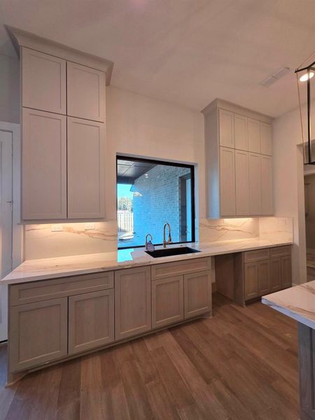 Enjoy washing dishes while looking outside your window into your backyard.