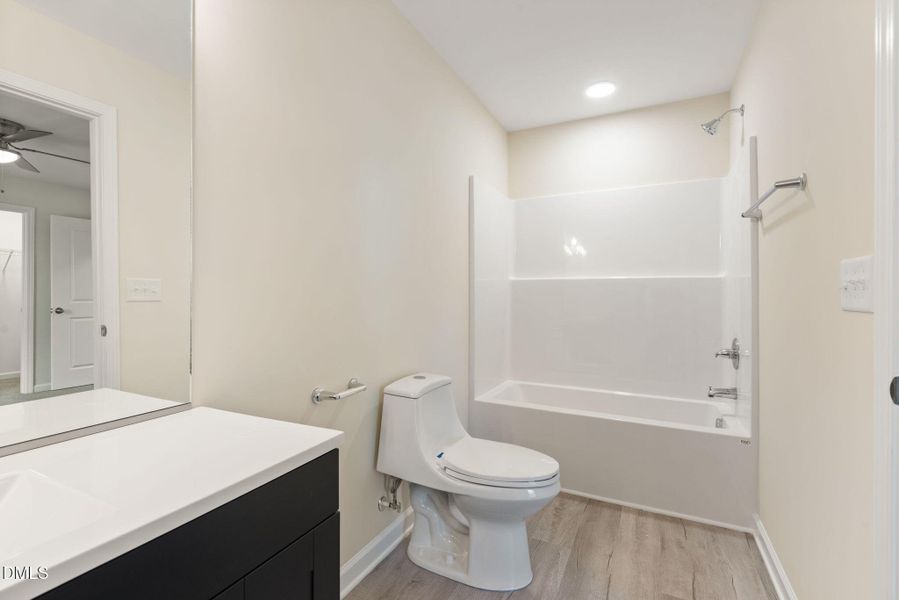 Primary BR bath has tub-shower combo