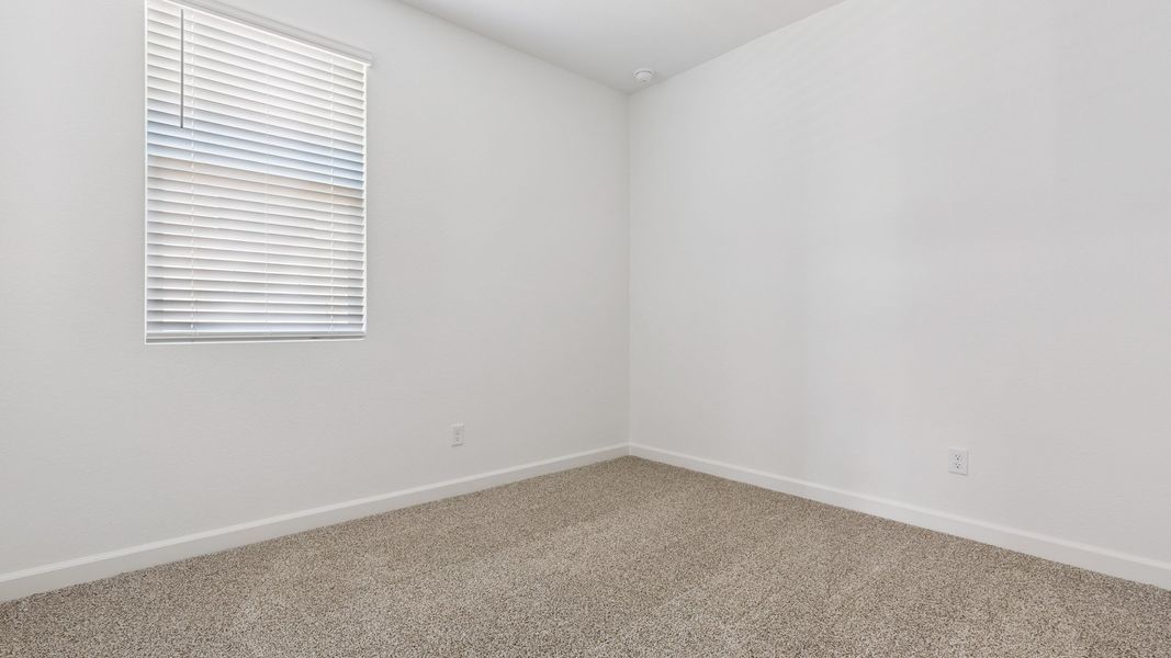 Spacious, unfurnished interior of a new home in Zanjero Pass, Waddell (Image 30).