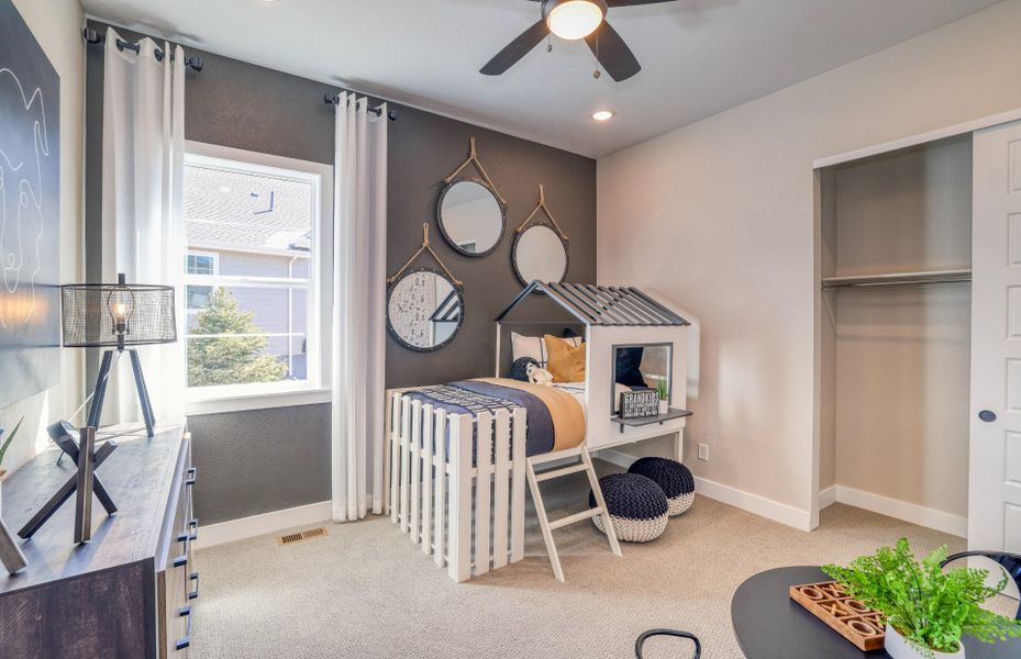 Furnished interior view inside a new home in Hilltop at Inspiration, Aurora (Image 12).