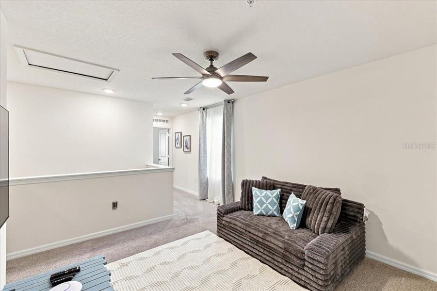 Furnished interior view inside a new home in Towns at Riverwalk, Sanford (Image 29). Furnished interior view inside a new home in Towns at Riverwalk, Sanford (Image 29).