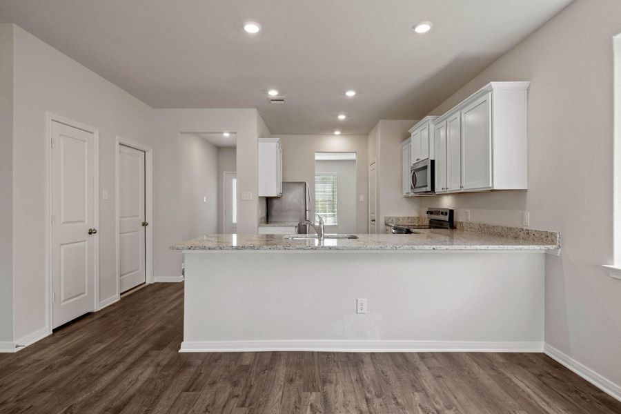 Furnished interior view inside a new home in Vacek Country Meadows, Richmond (Image 9).