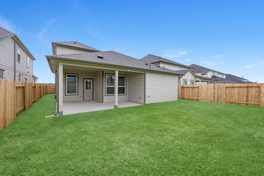Exterior details and patio area of a home in Grand Mason Crossing, Park Row (Image 4).