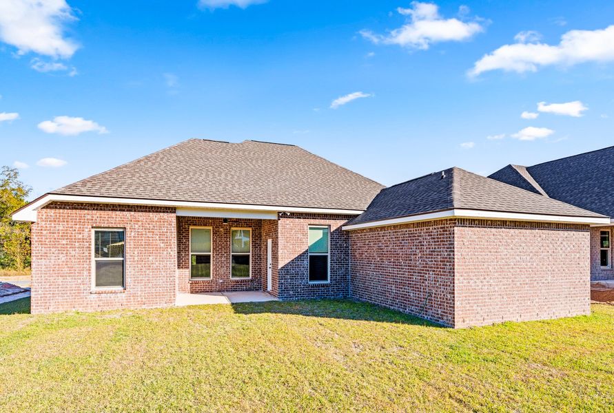 Exterior details and patio area of a home in Young Oaks, Crestview (Image 3).