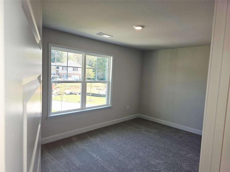 Spacious, unfurnished interior of a new home in Scarlett Place, Bowdon (Image 13).