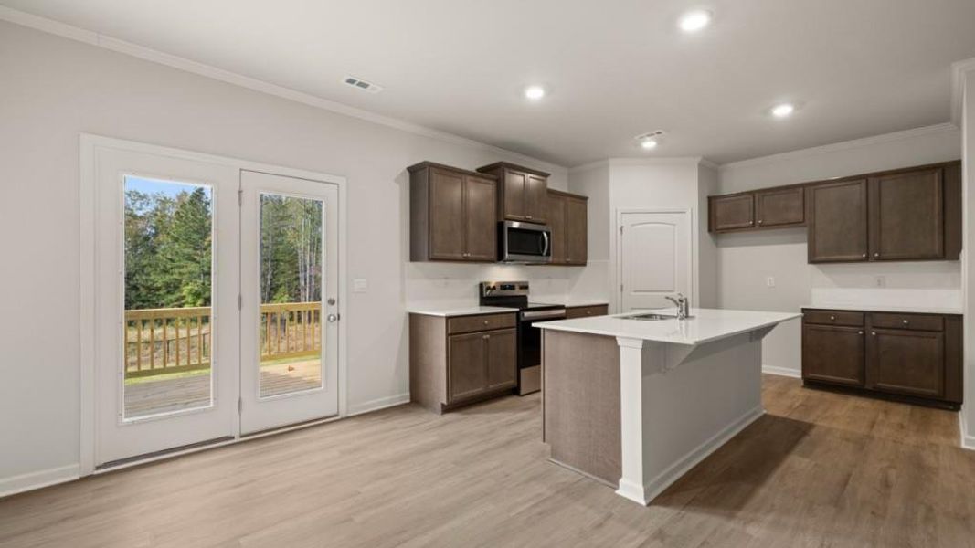 Furnished interior view inside a new home in Falcon Landing Townhomes, Gainesville (Image 4).