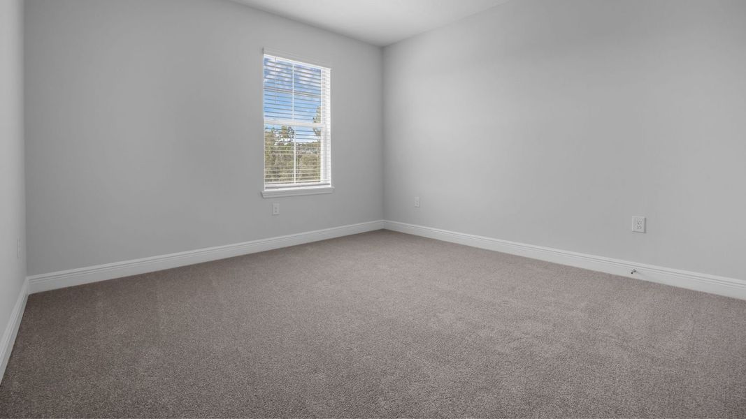 Representative unfurnished interior of a home built from the Torrey by D.R. Horton in Waterleigh, Winter Garden (Image 21).
