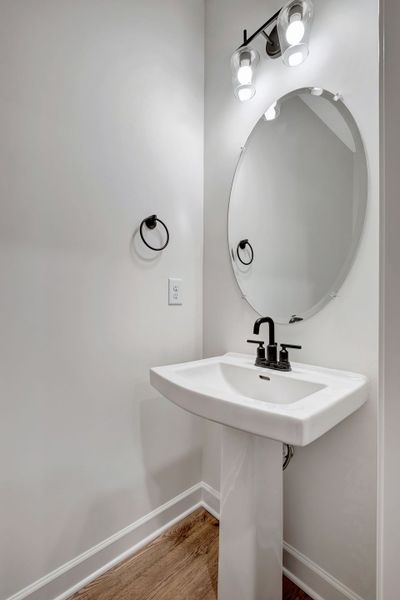 Stylish 2nd Floor Powder Room in The Ingram Townhome