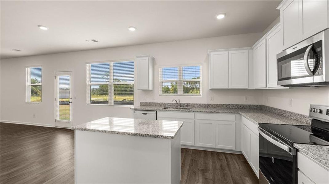 Furnished interior view inside a new home in Oakchase at Hampton, Hampton (Image 11).