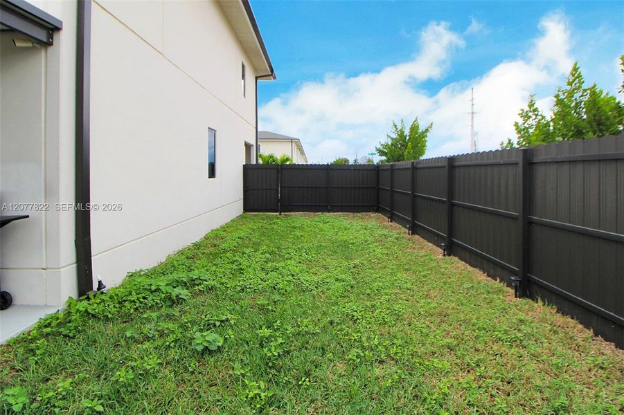 Exterior details and patio area of a home in , Florida City (Image 33).