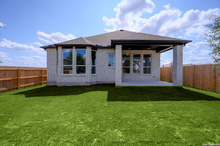 Exterior details and patio area of a home in Prominence, San Antonio (Image 2).