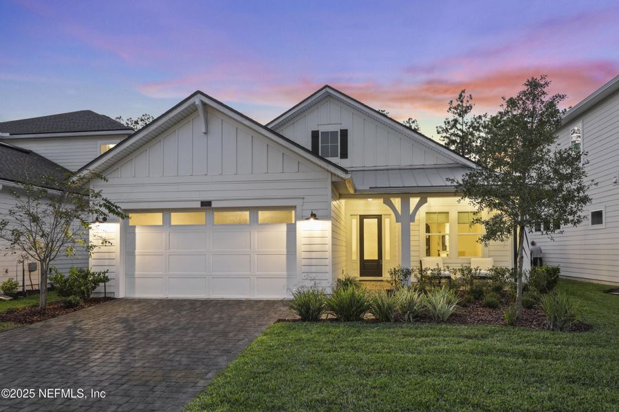 Front exterior of a new home in , Ponte Vedra, FL, highlighting curb appeal (Image 1).