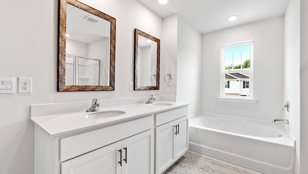 Furnished interior view inside a new home in Lakestone, Woodruff (Image 15).