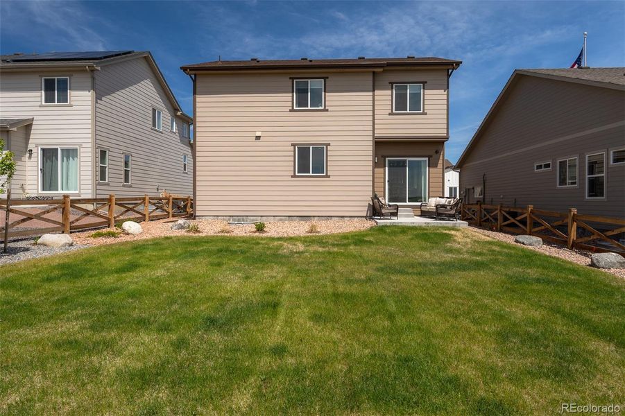 Front exterior of a new home in , Colorado Springs, CO, highlighting curb appeal (Image 22).
