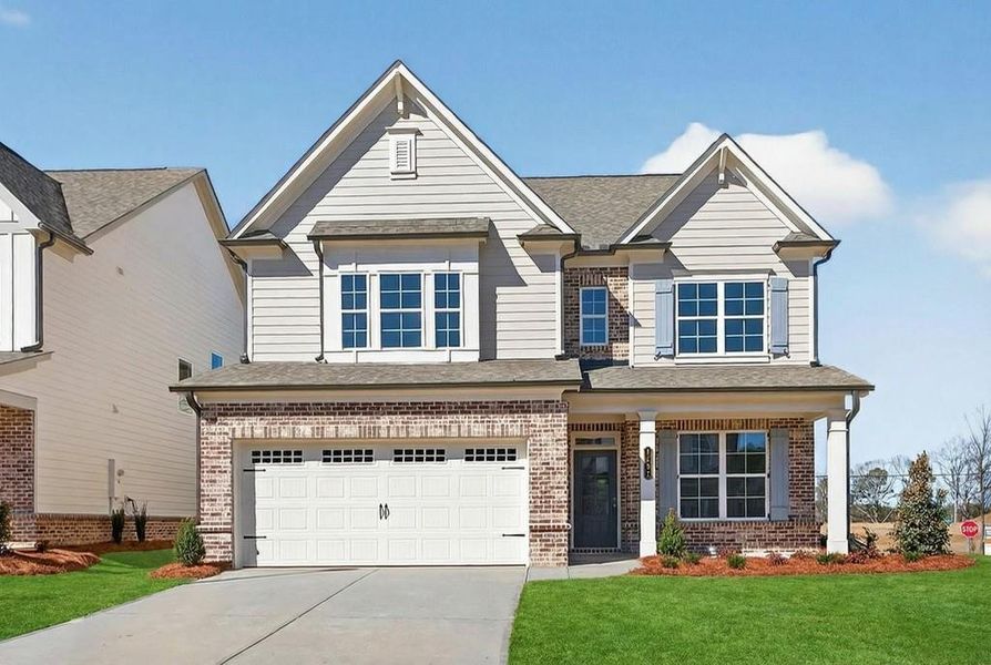 Front exterior of a new home in , Suwanee, GA, highlighting curb appeal (Image 2). Front exterior of a new home in , Suwanee, GA, highlighting curb appeal (Image 2).