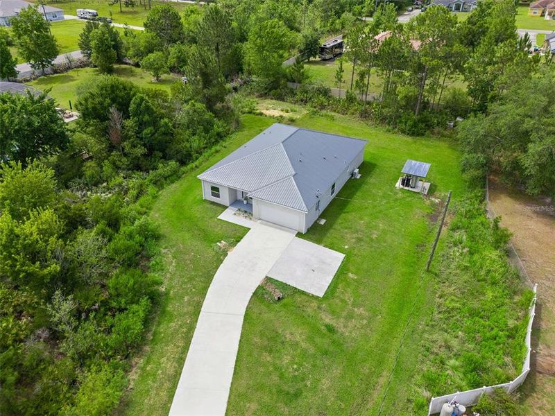 Front exterior of a new home in , Orlando, FL, highlighting curb appeal (Image 26).
