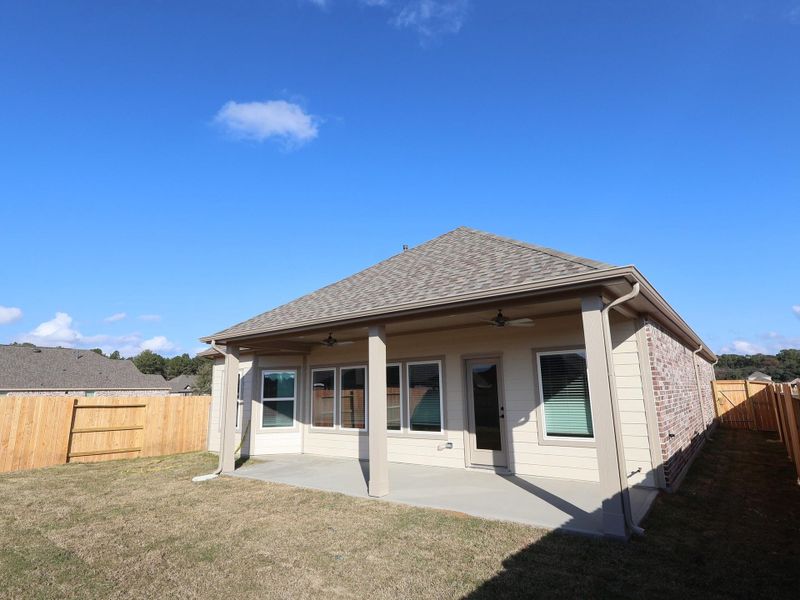 Exterior details and patio area of a home in Sorella, Tomball (Image 19).