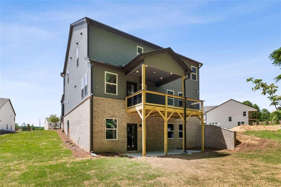 Exterior details and patio area of a home in The Paddocks at Doc Hughes, Buford (Image 4). Exterior details and patio area of a home in The Paddocks at Doc Hughes, Buford (Image 4).