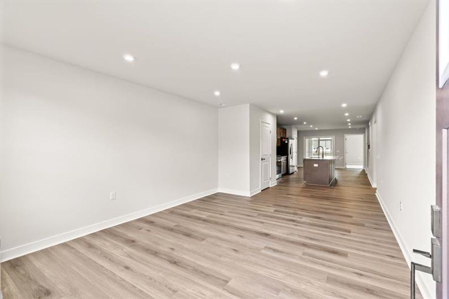 Spacious, unfurnished interior of a new home in Lakes at Riverbend, Navassa (Image 9).