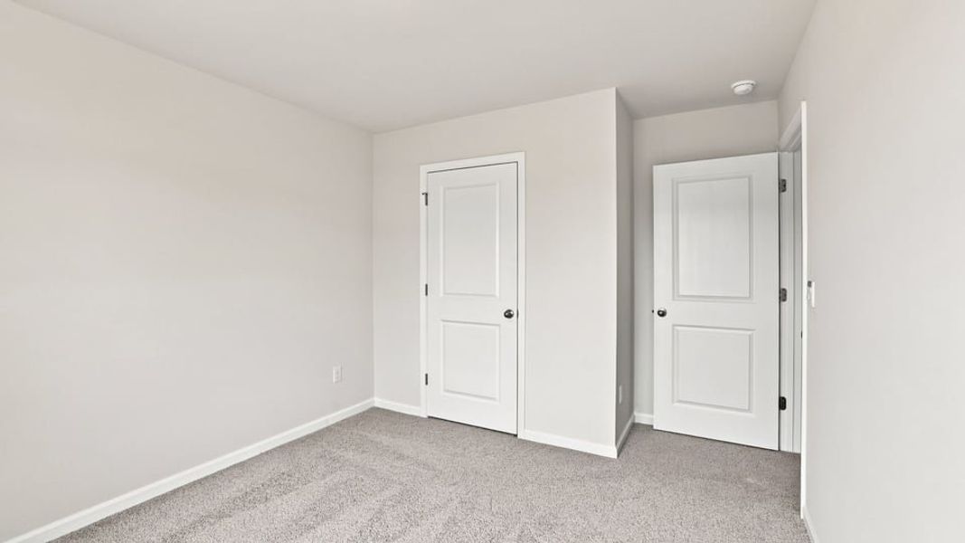 Spacious, unfurnished interior of a new home in Lakestone, Woodruff (Image 29).