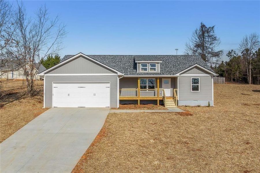 Front exterior of a new home in , Mount Airy, GA, highlighting curb appeal (Image 2). Front exterior of a new home in , Mount Airy, GA, highlighting curb appeal (Image 2).