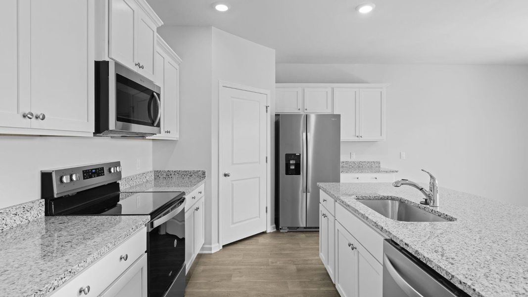 Furnished interior view inside a new home in The Ranch, Holly Hill (Image 5).