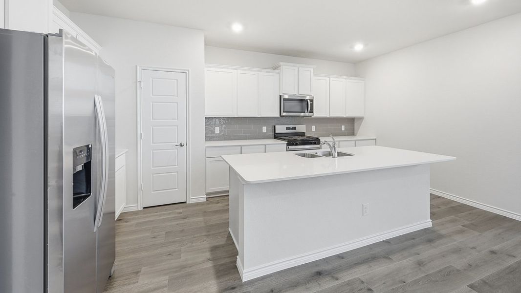 Furnished interior view inside a new home in Fireside by the Lake, Garland (Image 3).