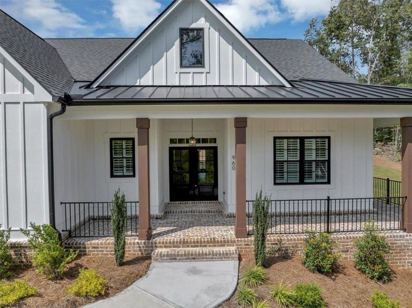 Front exterior of a new home in , Ball Ground, GA, highlighting curb appeal (Image 24).