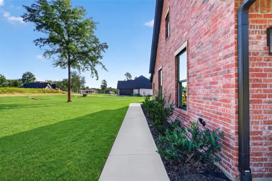 Exterior details and patio area of a home in , Kilgore (Image 32).
