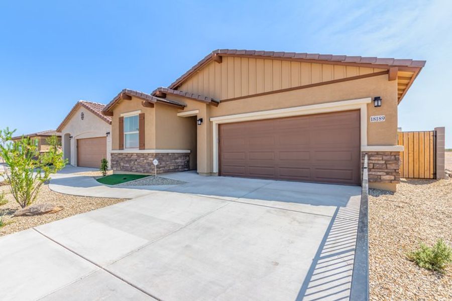 Representative exterior photo of a completed home built from the Hermosa by Courtland Communities in Maple at North Copper Canyon, Surprise, AZ (Image 13).