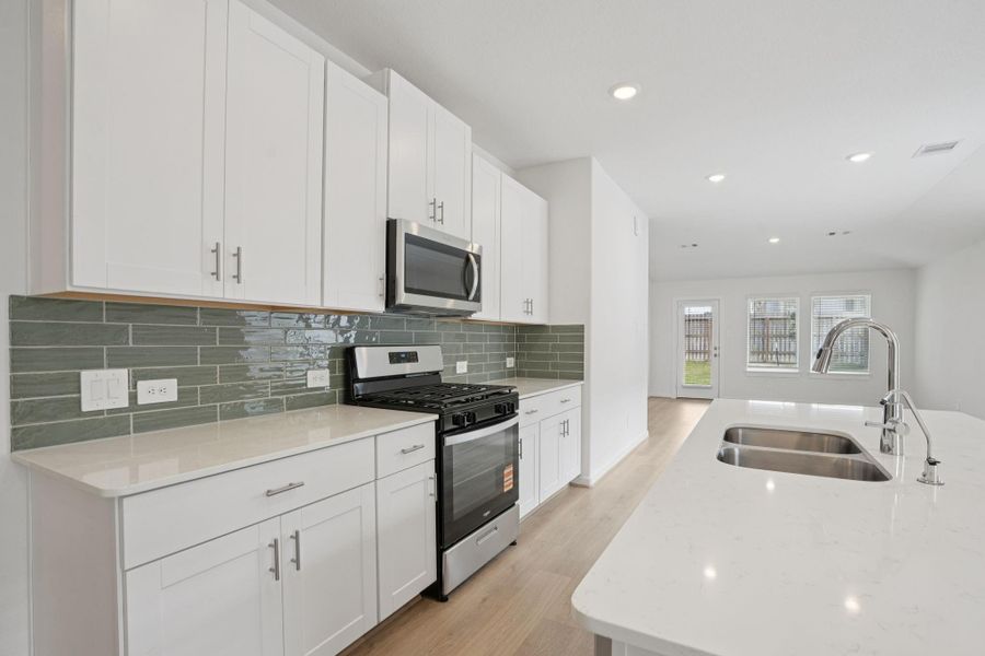 Furnished interior view inside a new home in Pine Lake Cove - Traditional Series, Montgomery (Image 9).