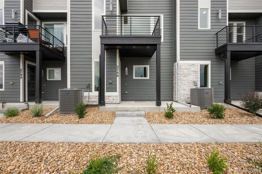 Front exterior of a new home in , Denver, CO, highlighting curb appeal (Image 13).