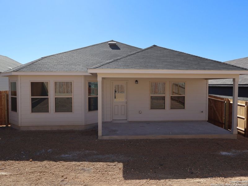 Exterior details and patio area of a home in Hunters Ranch, San Antonio (Image 3).