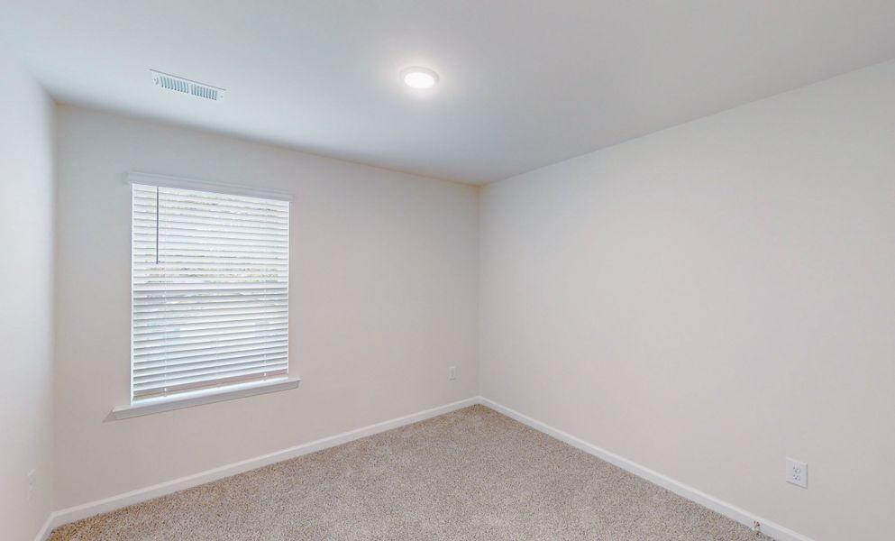 Representative unfurnished interior of a home built from the Stoneycreek Plan for Meece by Veranda Homes in Meece, Easley (Image 20).