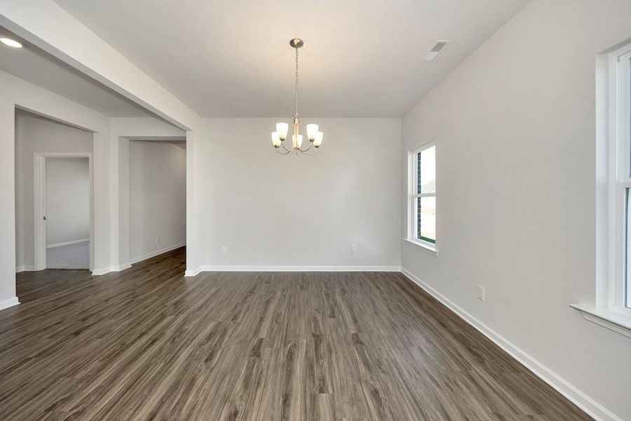 The Avery- Dining Room. Home under construction. Sample floor plan photo used for illustrative purposes only. Upgrades, selections options, and colors will vary.