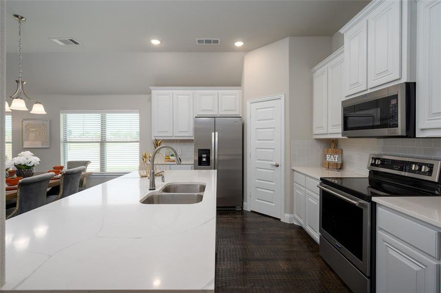 Furnished interior view inside a new home in Creekview Meadows, Pilot Point (Image 17).