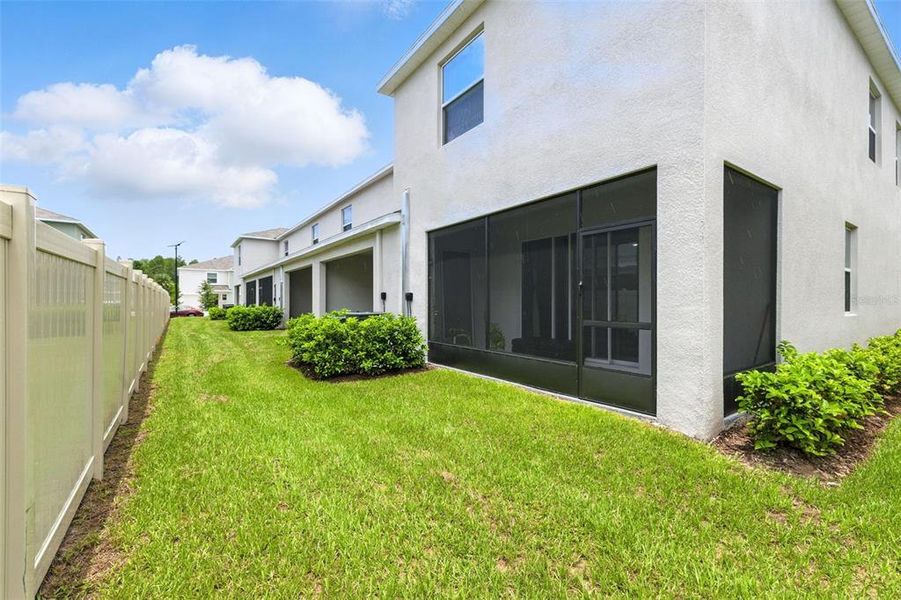 Front exterior of a new home in Westwood, Land O' Lakes, FL, highlighting curb appeal (Image 2). Front exterior of a new home in Westwood, Land O' Lakes, FL, highlighting curb appeal (Image 2).