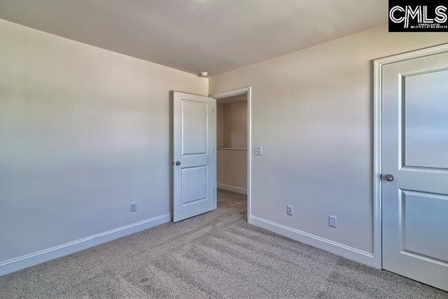 Spacious, unfurnished interior of a new home in Cottages at Roofs Pond, West Columbia (Image 35).