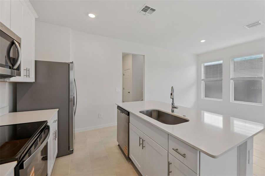 Furnished interior view inside a new home in The Meadow at Crossprairie Bungalows, St. Cloud (Image 9).
