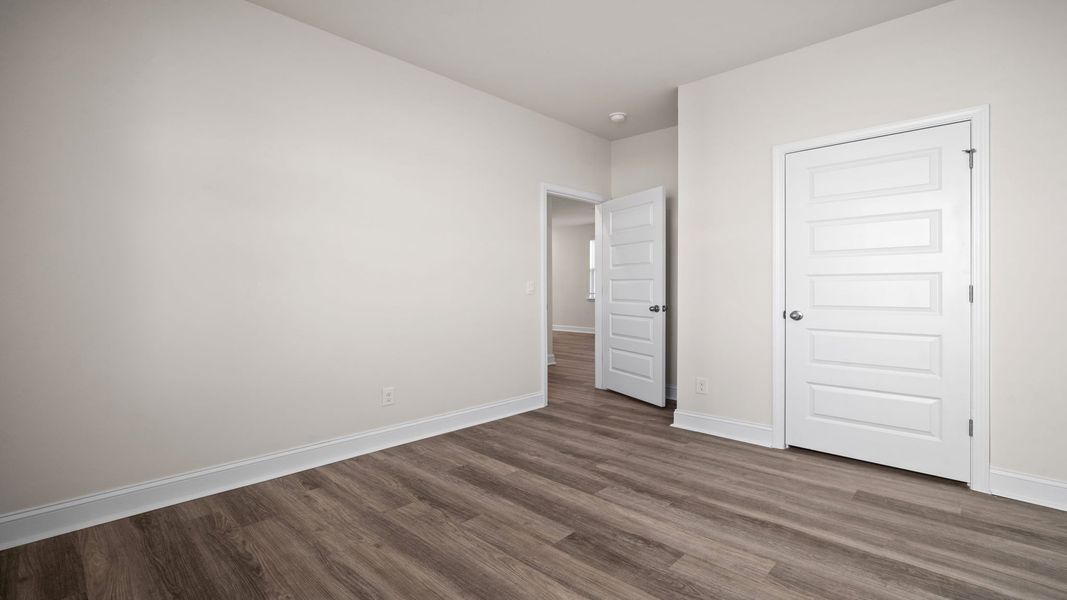 Spacious, unfurnished interior of a new home in The Groves at Bees Creek, Ridgeland (Image 20).
