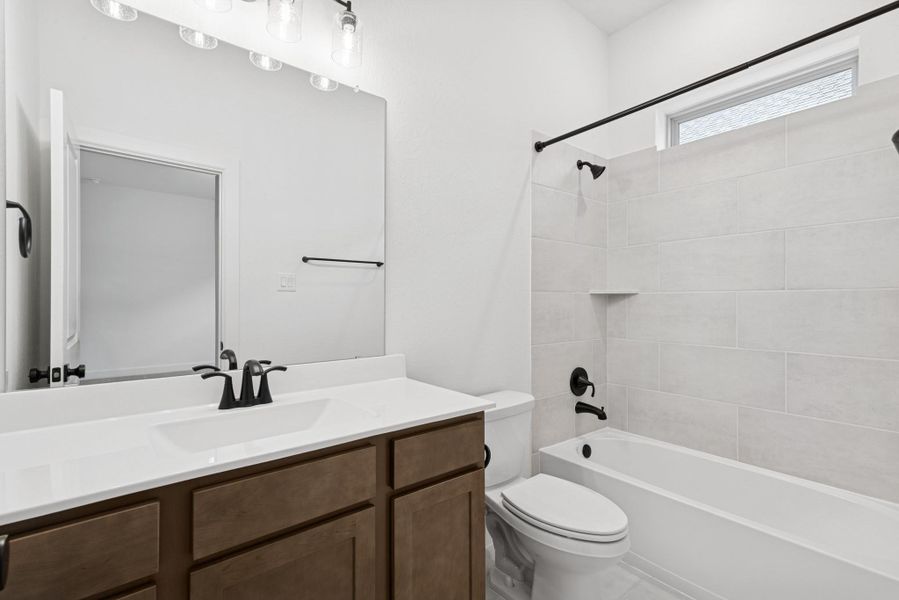 Furnished interior view inside a new home in Meridiana 55' Homesites, Manvel (Image 7).