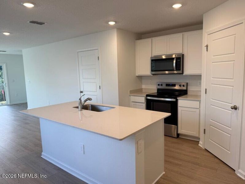 Furnished interior view inside a new home in Trout River, Jacksonville (Image 11).