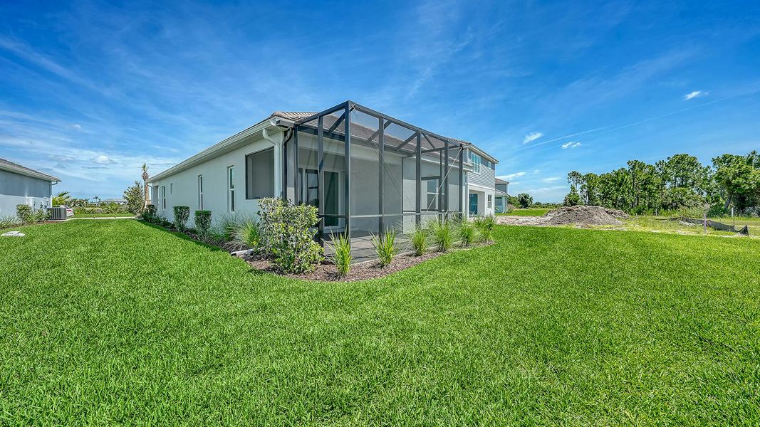 Exterior details and patio area of a home in Palmera Real Estate and Homes for Sale in Venice, FL - Neal Communities, Venice (Image 26). Exterior details and patio area of a home in Palmera Real Estate and Homes for Sale in Venice, FL - Neal Communities, Venice (Image 26).