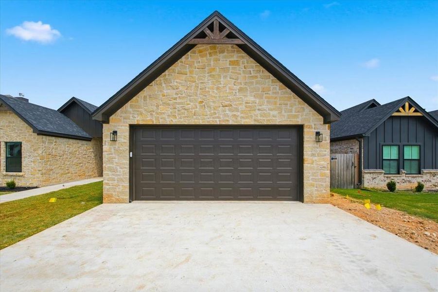 Front exterior of a new home in , Woodway, TX, highlighting curb appeal (Image 19). Front exterior of a new home in , Woodway, TX, highlighting curb appeal (Image 19).