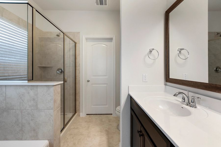 Representative furnished interior of a home built from the Cambridge by Ashton Woods in Lagos Reserve, Manor (Image 11). Representative furnished interior of a home built from the Cambridge by Ashton Woods in Lagos Reserve, Manor (Image 11).