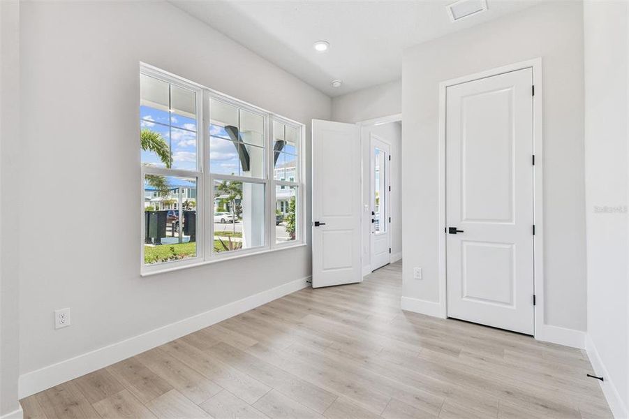 Spacious, unfurnished interior of a new home in Emerald Landing at Waterside at Lakewood Ranch – Cottage Series, Sarasota (Image 14).