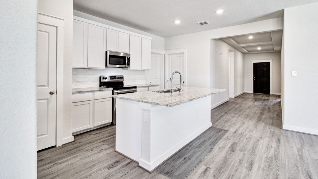 Representative furnished interior of a home built from the Paramount by Brightland Homes in Cielo, Conroe (Image 5).